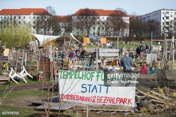 Banner reading 'Tempelhof for everybody instead of luxury-building and pay-park' at the Tempelhofer Feld park in Berlin, Germany on March 25, 2017.