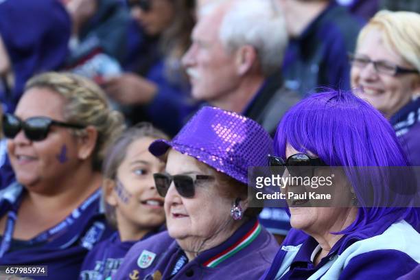 Spectators look on during the round one AFL match between the Fremantle Dockers and the Geelong Cats at Domain Stadium on March 26, 2017 in Perth,...