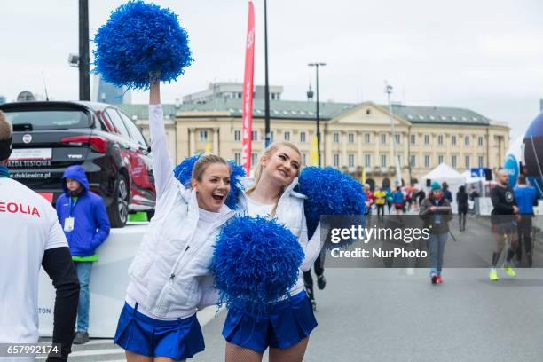 Cheerleaders during the 12th PZU Warsaw Half Marathon in Warsaw, Poland on 26 March 2017