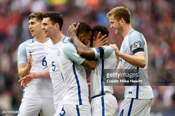 Jermaine Defoe of England celebrates with Ryan Bertrand after scoring his sides first goal during the FIFA 2018 World Cup Qualifier between England...