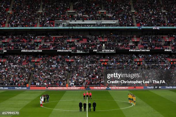 Players, officials, fans and dignitaries remember those who lost their lives in the recent Westminster terrorist attacks prior to the FIFA 2018 World...