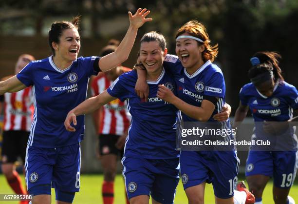 Ramona Bachmann celebrates with her team mates Karen Carney and Ji So Yun after making it 2-1 during the Women's FA Cup Quarter Final between Chelsea...