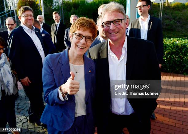 Annegret Kramp-Karrenbauer, lead candidate of the German Christian Democrats , speaks to the press after initial elections results gave the SPD a...