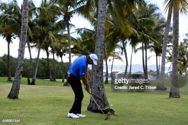 Retief Goosen of South Africa plays his second shot from the rough on the 18th hole during the final round of the Puerto Rico Open at Coco Beach on...