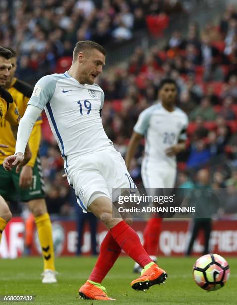 England's striker Jamie Vardy shoots to score their second goal during the World Cup 2018 qualification football match between England and Lithuania...