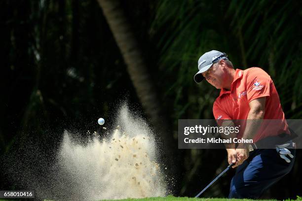 Points plays his second shot from a bunker on the 11th hole during the final round of the Puerto Rico Open at Coco Beach on March 26, 2017 in Rio...