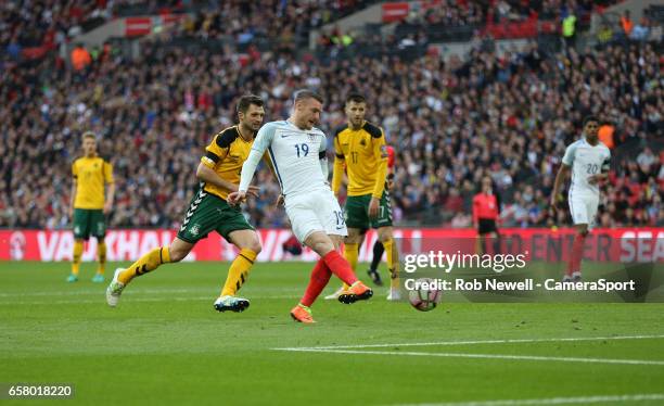 England's Jamie Vardy scores his sides second goal during the FIFA 2018 World Cup Qualifier between England and Lithuania at Wembley Stadium on March...
