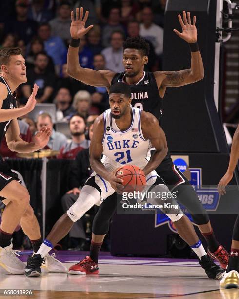 Amile Jefferson of the Duke Blue Devils moves the ball against the South Carolina Gamecocks during the second round of the 2017 NCAA Men's Basketball...
