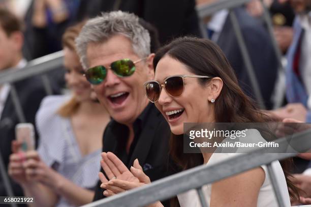Producer/musician David Foster and Lauren Silverman attend the ceremony honoring Haim Saban with star on the Hollywood Walk of Fame on March 22, 2017...