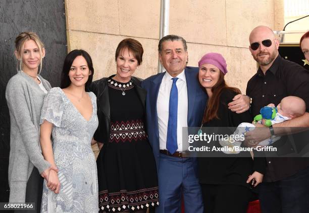 Producer Haim Saban, wife Cheryl Saban and family attend the ceremony honoring Haim Saban with star on the Hollywood Walk of Fame on March 22, 2017...