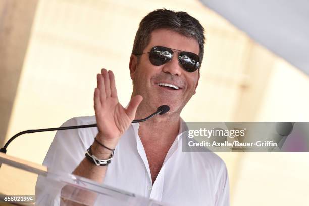 Producer Simon Cowell attends the ceremony honoring Haim Saban with star on the Hollywood Walk of Fame on March 22, 2017 in Hollywood, California.