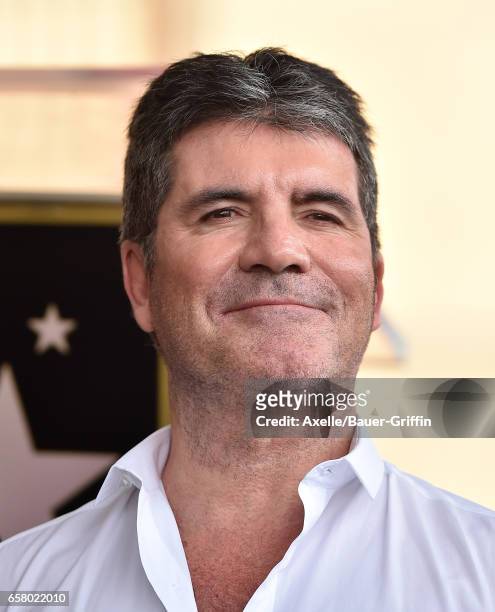 Producer Simon Cowell attends the ceremony honoring Haim Saban with star on the Hollywood Walk of Fame on March 22, 2017 in Hollywood, California.