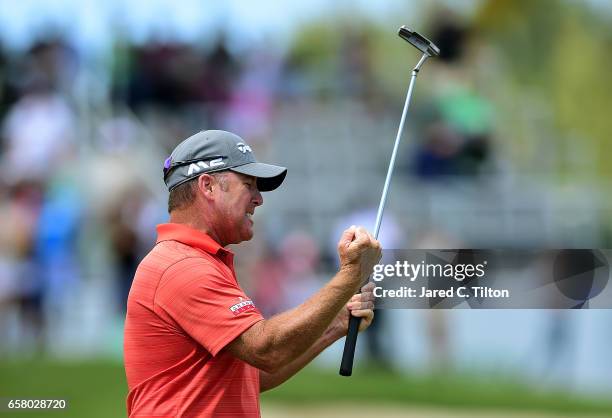 Points celebrates after making his birdie putt on the 18th green during the final round to win the Puerto Rico Open at Coco Beach on March 26, 2017...