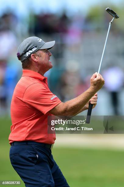 Points celebrates after making his birdie putt on the 18th green during the final round to win the Puerto Rico Open at Coco Beach on March 26, 2017...