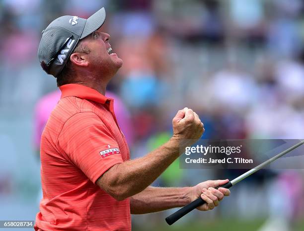 Points celebrates after making his birdie putt on the 18th green during the final round to win the Puerto Rico Open at Coco Beach on March 26, 2017...