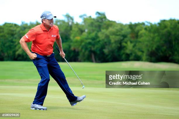 Points celebrates after making his birdie putt on the 18th green during the final round to win the Puerto Rico Open at Coco Beach on March 26, 2017...