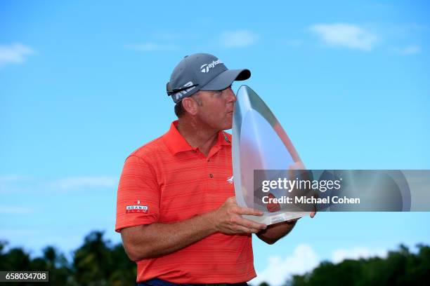 Points holds the trophy after winning the Puerto Rico Open at Coco Beach on March 26, 2017 in Rio Grande, Puerto Rico.