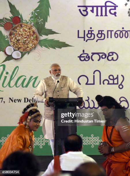 Prime Minister Narendra Modi during the celebration on the occasion of "Ugadi" according to Hindu Calendar at Venkaiah Naidu's residence on March 26,...