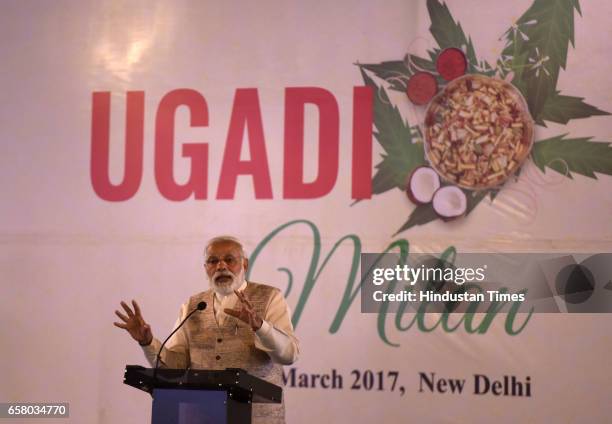 Prime Minister Narendra Modi during the celebration on the occasion of "Ugadi" according to Hindu Calendar at Venkaiah Naidu's residence on March 26,...