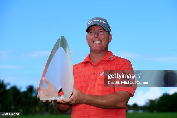 Points holds the trophy after winning the Puerto Rico Open at Coco Beach on March 26, 2017 in Rio Grande, Puerto Rico.