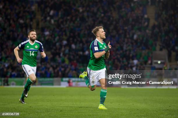 Northern Ireland's Jamie Ward celebrates scoring the opening goal during the FIFA 2018 World Cup Qualifier between Northern Ireland and Norway at...