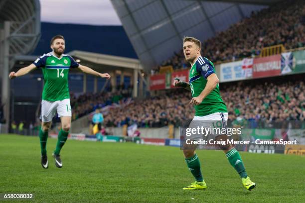 Northern Ireland's Jamie Ward celebrates scoring the opening goal during the FIFA 2018 World Cup Qualifier between Northern Ireland and Norway at...