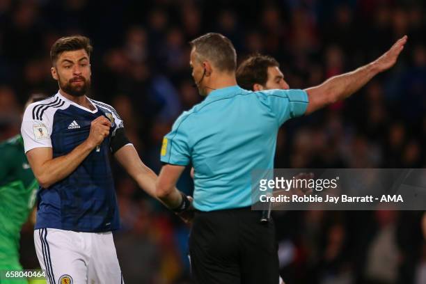 Russell Martin of Scotland reacts after having a goal disallowed during the FIFA 2018 World Cup Qualifier between Scotland and Slovenia at Hampden...