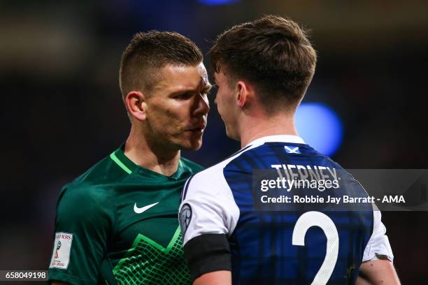 Roman Bezjak of Slovenia and Kieran Tierney of Scotland square up to each other during the FIFA 2018 World Cup Qualifier between Scotland and...