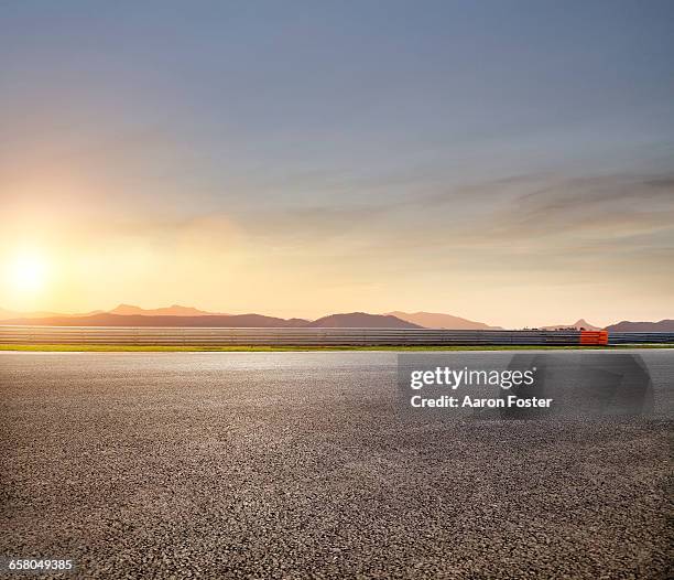 race track sunset edit - dusk road stock pictures, royalty-free photos & images