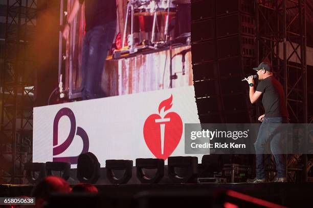 Cole Swindell performs onstage during BeautyKind Unites: Concert for Causes at AT&T Stadium on March 25, 2017 in Arlington, Texas.