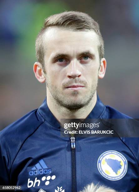 Bosnia and Herzegovina's Edin Visca lines up with teammates before the FIFA World Cup 2018 qualification football match between Bosnia and...