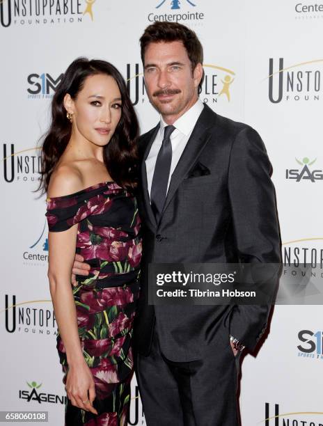 Maggie Q and Dylan McDermott attend the 8th annual Unstoppable Foundation Gala at The Beverly Hilton Hotel on March 25, 2017 in Beverly Hills,...