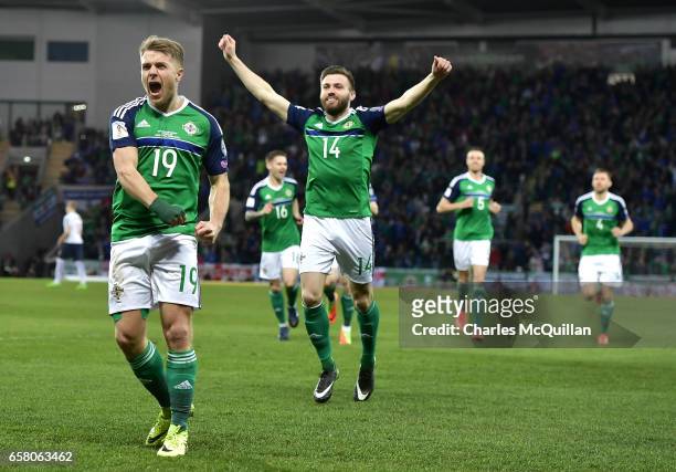 Jamie Ward of Northern Ireland celebrates after scoring the opening goal during the FIFA 2018 World Cup Qualifier between Northern Ireland and Norway...
