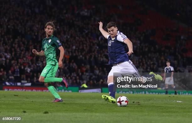 Chris Martin of Scotland scores during the FIFA 2018 World Cup Qualifier between Scotland and Slovenia at Hampden Park on March 26, 2017 in Glasgow,...