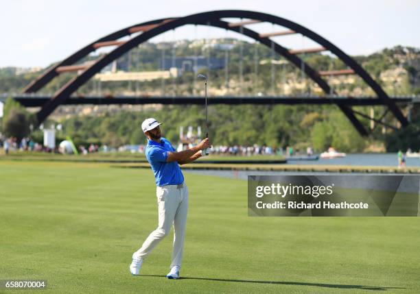 Dustin Johnson plays a shot on the 13th hole during the final match of the World Golf Championships-Dell Technologies Match Play at the Austin...