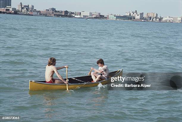 Canoeing on the Detroit River in Detroit, Michigan, April 1986.