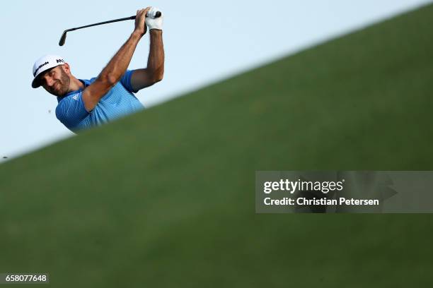 Dustin Johnson plays a shot on the 18th hole during the final match of the World Golf Championships-Dell Technologies Match Play at the Austin...