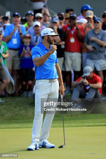 Dustin Johnson reacts after winning the final match of the World Golf Championships-Dell Technologies Match Play over Jon Rahm of Spain 1 up on the...