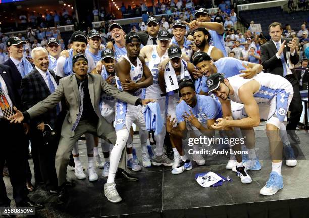 The North Carolina Tar Heels celebrate after defeating the Kentucky Wildcats during the 2017 NCAA Men's Basketball Tournament South Regional at...