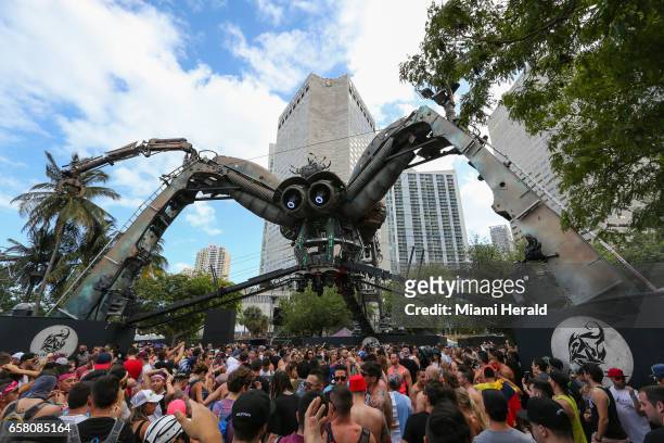 Guests dance at the Arcadia Spider stage during the third day of Ultra Music Festival on Sunday, March 26, 2017 in downtown Miami, Fla.