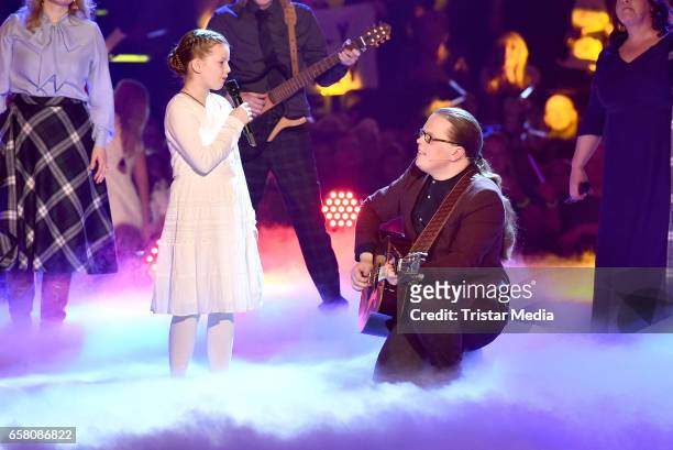 Angelo Kelly and his daughter Emma Kelly perform during the show 'Schlagercountdown - Das grosse Premierenfest' at EWE Arena on March 25, 2017 in...