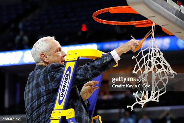 Head coach Roy Williams of the North Carolina Tar Heels cuts down the net after defeating the Kentucky Wildcats during the 2017 NCAA Men's Basketball...