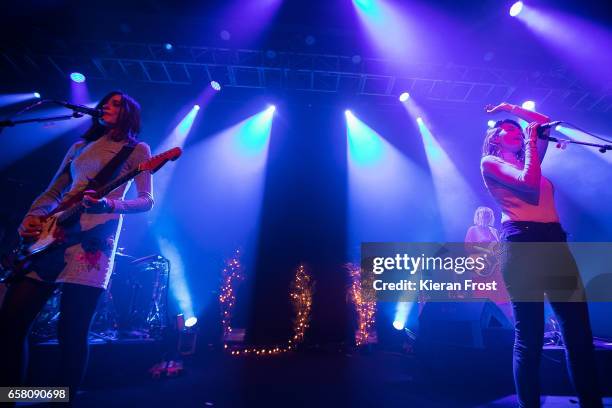 Theresa Wayman, Jenny Lee Lindberg, and Emily Kokal of Warpaint perform at Vicar Street on March 26, 2017 in Dublin, Ireland.