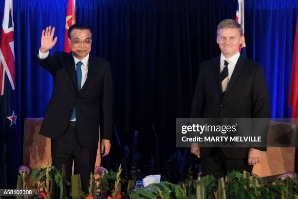 New Zealand's Prime Minister Bill English arrives at a joint press conference with China's Premier Li Keqiang in Wellington on March 27, 2017. Li is...