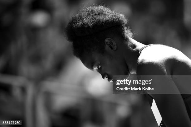 Jotham Kuku of Victoria watches on as he competes in the mens under 17 triple jump on day two of the 2017 Australian Athletics Championships at...