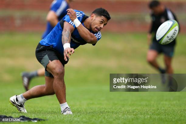 Te Toiroa Tahuriorangi passes during a Hurricanes training session at Rugby League Park on March 27, 2017 in Wellington, New Zealand.