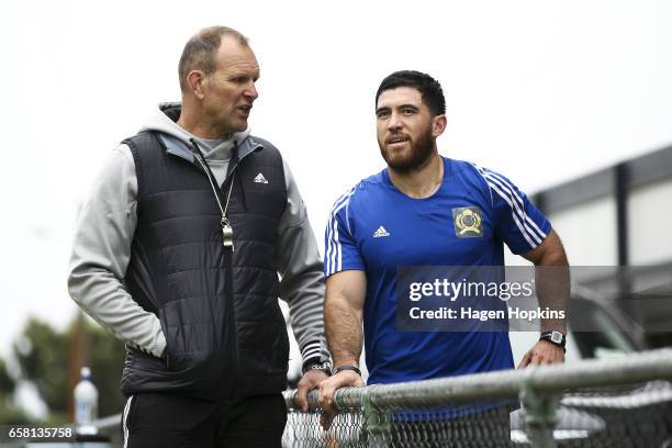 Assistant Coach John Plumtree talks to an injured Nehe-Milner-Skudder during a Hurricanes training session at Rugby League Park on March 27, 2017 in...