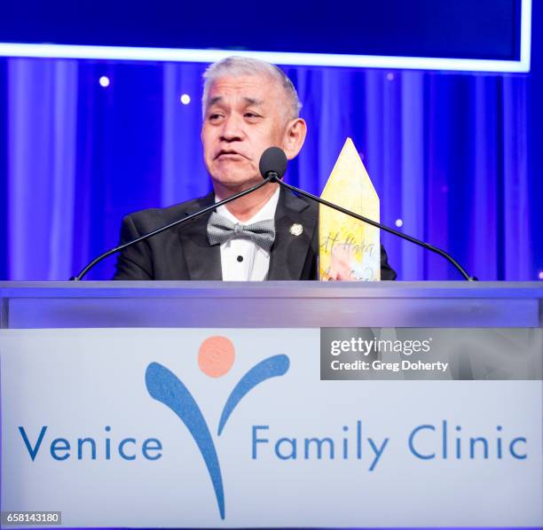 Dr. Jimmy Hara receives an award at the 35th Annual Silver Circle Gala at The Beverly Hilton Hotel on March 26, 2017 in Beverly Hills, California.