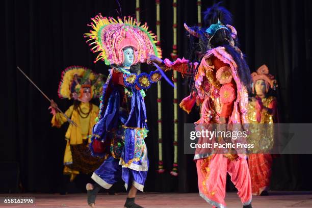 Artistes from Purulia district of West Bengal performs Chhau dance at "Chhau Parva" organised by Sangeet Natak Akademi, New Delhi in association with...