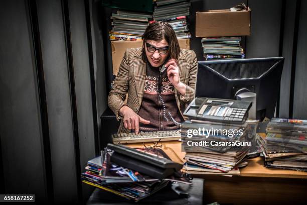 concept image of a stressful day in a tiny office - journalist desk stock pictures, royalty-free photos & images